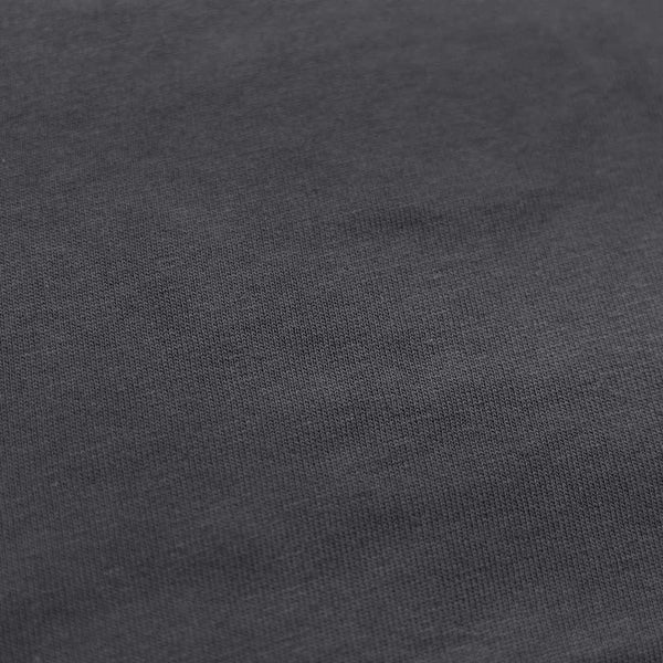 Dark grey cotton t-shirt with embroidered turtle patch (Cheloniidae IV). Made in Portugal from natural cotton, this limited edition shirt reflects Indagatio’s sustainable and thoughtful craftsmanship.